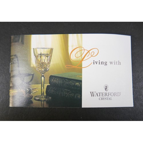 73 - Waterford Crystal a pair of Millennium collection toasting flutes, boxed.