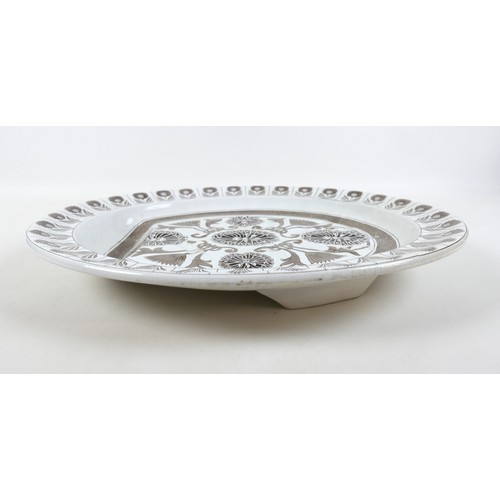 74 - A Marigold pattern meat plate with a well, 48cm by 40cm by 6cm.