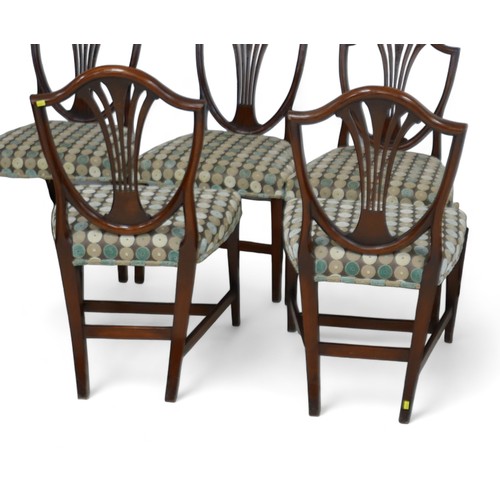 617 - A set of eight mahogany dining chairs in the Georgian taste, with overstuffed seats, including two c... 