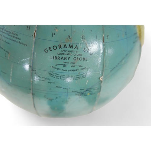 160 - A Georama Ltd illuminated terrestrial 12 inch library globe, 38cm high.