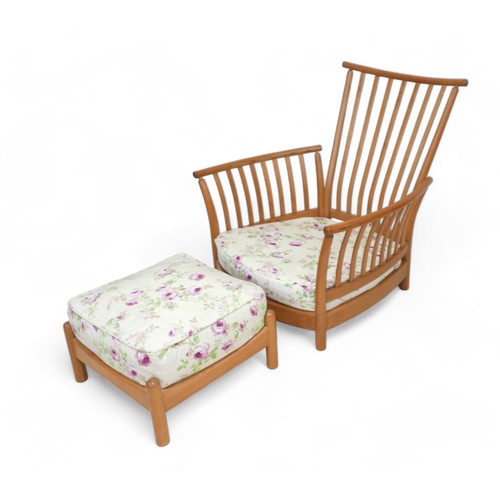 632 - An Ercol three piece slat back blonde elm lounge suite, comprising a three seater sofa, model 1068, ... 