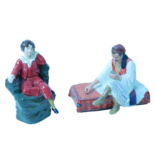 72 - Two studio pottery figures of an Albanian dice thrower and Red Boy by Reg Johnson.