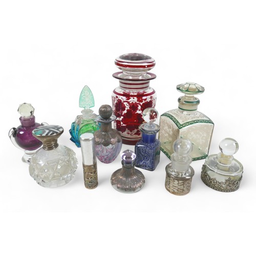 93 - A collection of ten scent bottles and lidded bottle, tallest 16cm. (11)