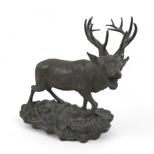 303 - After Christopher Fratin, (French 1801-1864): a bronze sculpture, modelled as a braying stag, on nat... 