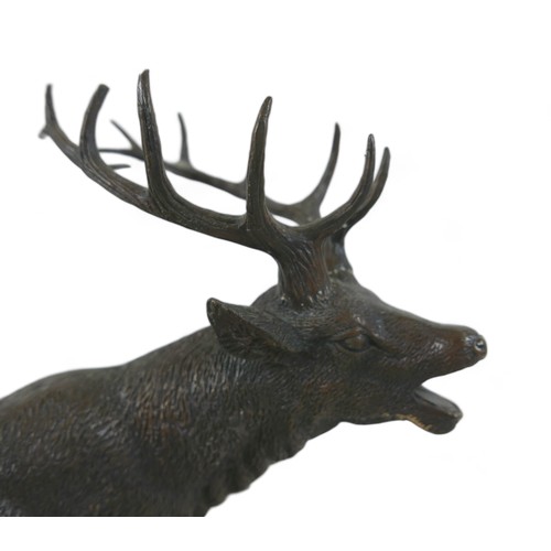 303 - After Christopher Fratin, (French 1801-1864): a bronze sculpture, modelled as a braying stag, on nat... 