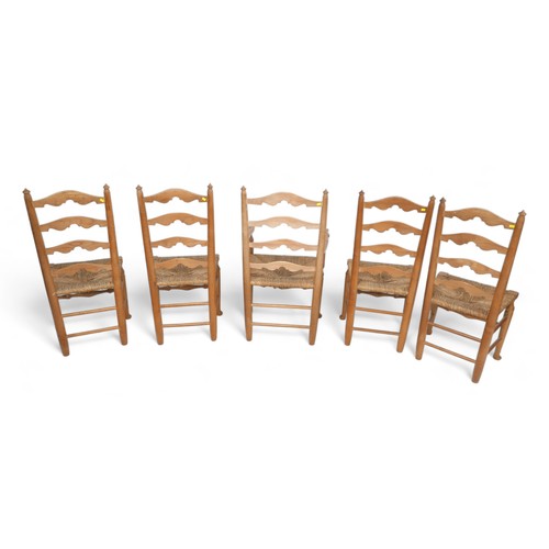 605 - A set of five modern ladder back, rush seated dining chairs, four plus carver, by J. H. Palin, a Lin... 