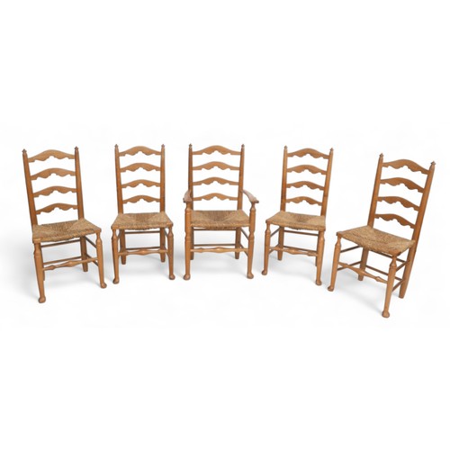 605 - A set of five modern ladder back, rush seated dining chairs, four plus carver, by J. H. Palin, a Lin... 