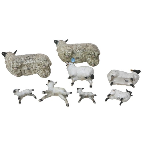 90 - Eight Beswick figurines, including two Wensleydale sheep, 10.5cm high, as well as six other sheep an... 