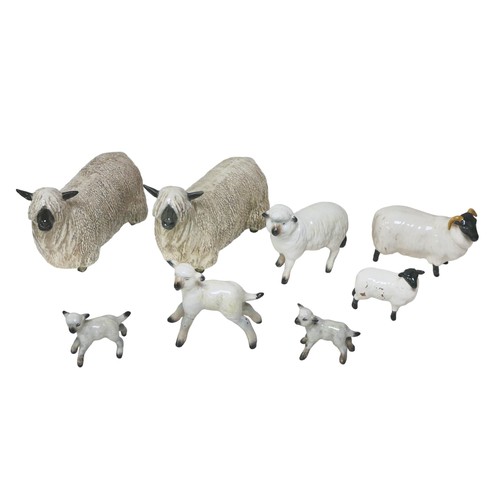 90 - Eight Beswick figurines, including two Wensleydale sheep, 10.5cm high, as well as six other sheep an... 