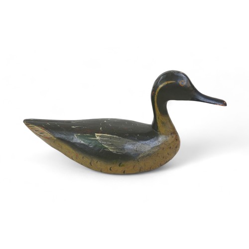 168 - A well carved and painted decoy duck, 35cm by 13cm by 17m tall.