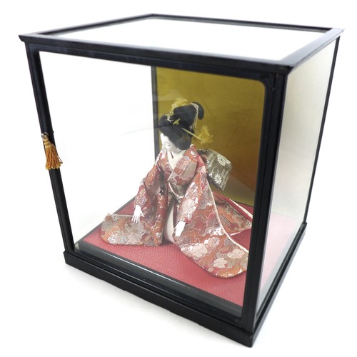 187 - A Japanese Geisha girl doll in display case, 41 by 36 by 44cm high.