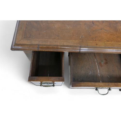 628 - A walnut lowboy, with three small drawers and cabriole legs, 73 by 47 by 73cm high.