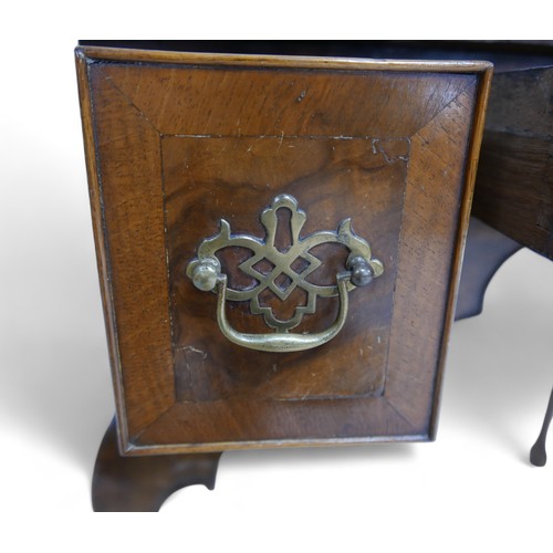 628 - A walnut lowboy, with three small drawers and cabriole legs, 73 by 47 by 73cm high.