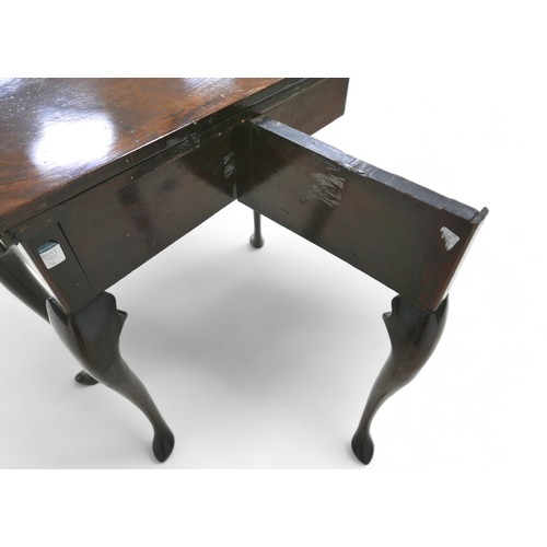 629 - An early Georgian mahogany side table, with folding table top surface, gate leg action, with single ... 