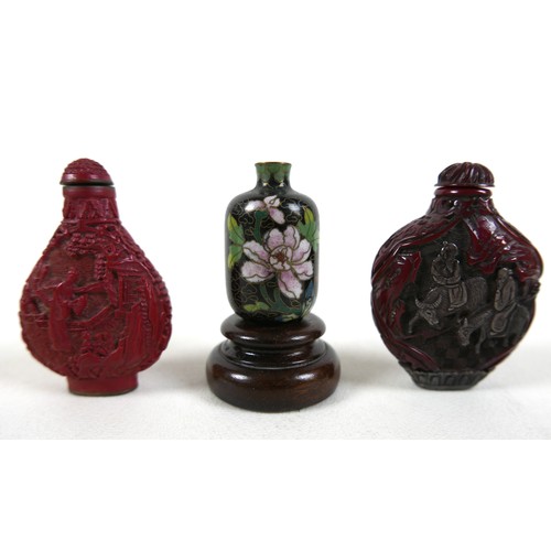 7 - A group of Oriental items, comprising carved red resin, cinnabar lacquer style, scent or snuff bottl... 