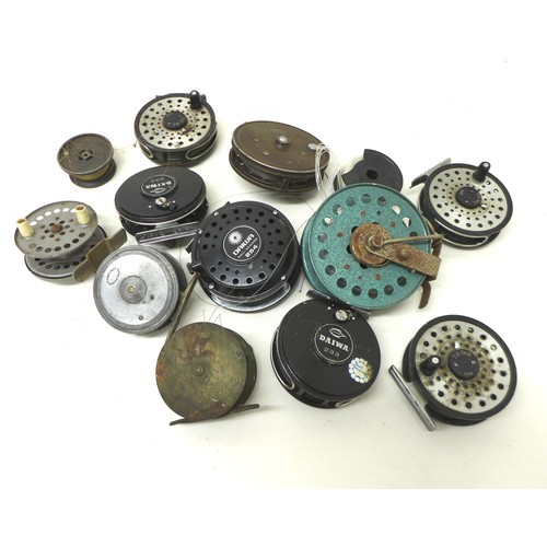 171 - Eleven assorted fly fishing reels including Daiwa, A Carter & Co, and Milward.