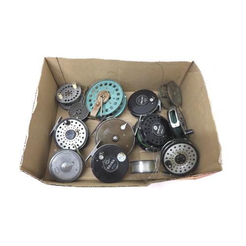 171 - Eleven assorted fly fishing reels including Daiwa, A Carter & Co, and Milward.