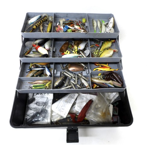 172 - A collection of spoon and bait fishing lures and floats, approximately 80 in total, contained in two... 