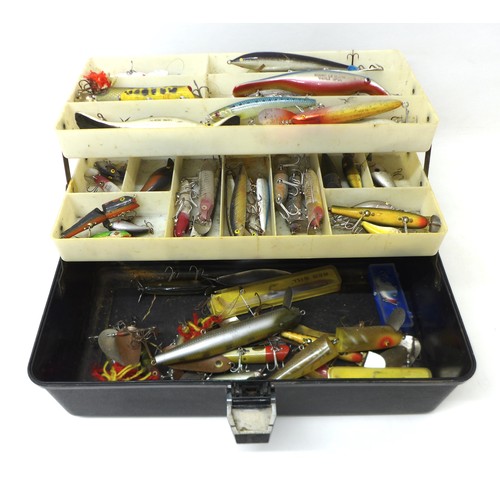 174 - A collection of spoon and bait fishing lures, approximately 50 in total, contained in a folding case... 