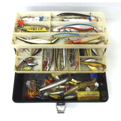 174 - A collection of spoon and bait fishing lures, approximately 50 in total, contained in a folding case... 