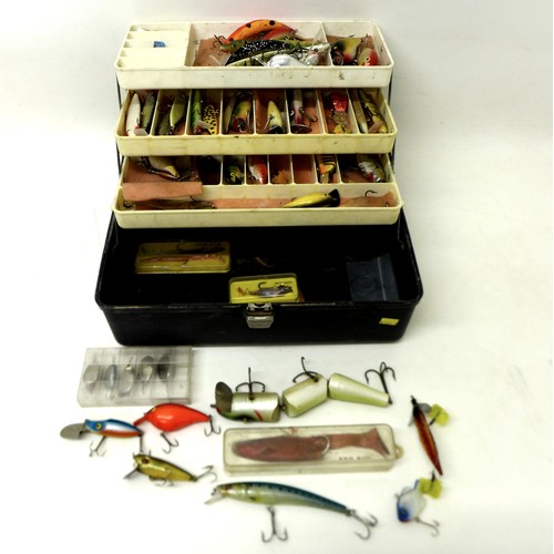 176 - A collection of spoon and bait fishing lures, approximately 50 in total, contained in a folding case... 