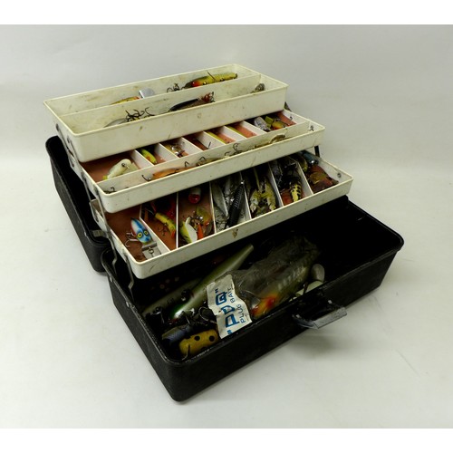 180 - A collection of spoon and bait fishing lures, approximately 80 in total, contained in a folding case... 