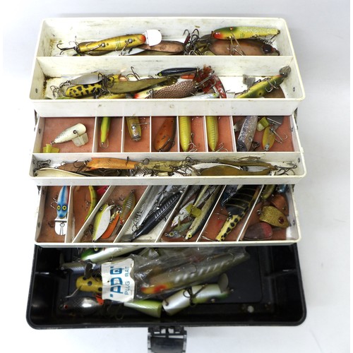 180 - A collection of spoon and bait fishing lures, approximately 80 in total, contained in a folding case... 