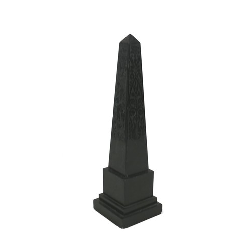 132A - A 19th century slate obelisk, in Grand Tour style, with polished surfaces engraved with foliate and ... 