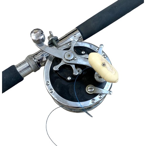 177 - A Daiwa Cruiser deluxe Mill 30lb sea rod with fifteen assorted lures.