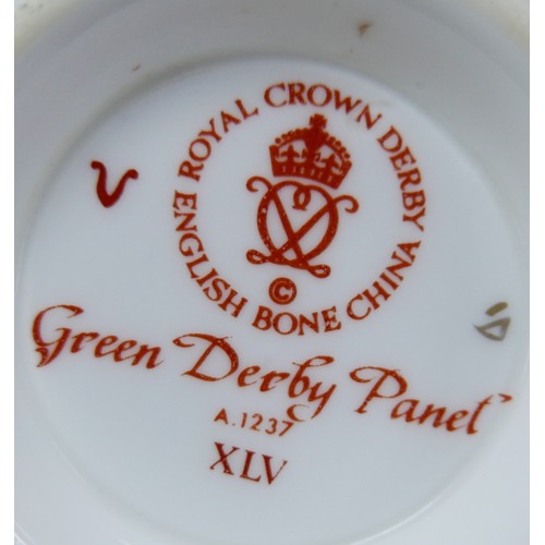 106 - A Royal Crown Derby bone china Green Derby Panel dinner and tea service, forty pieces including a pa... 