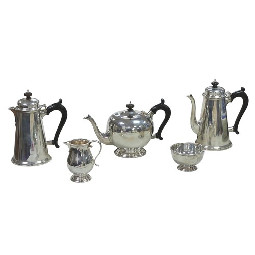 An ERII five-piece Britannia silver tea and coffee set, comprising tea pot, 16.5cm high, coffee pot, hot water pot, milk jug, sugar bowl, Collingwood & Co. London 1982, approximately 95toz overall. (5)