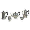 An ERII five-piece Britannia silver tea and coffee set, comprising tea pot, 16.5cm high, coffee pot,... 