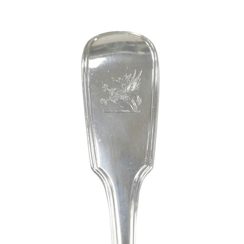 64 - A William IV silver ladle, William Eaton, London 1836, 9.4toz, 35.5cm long.