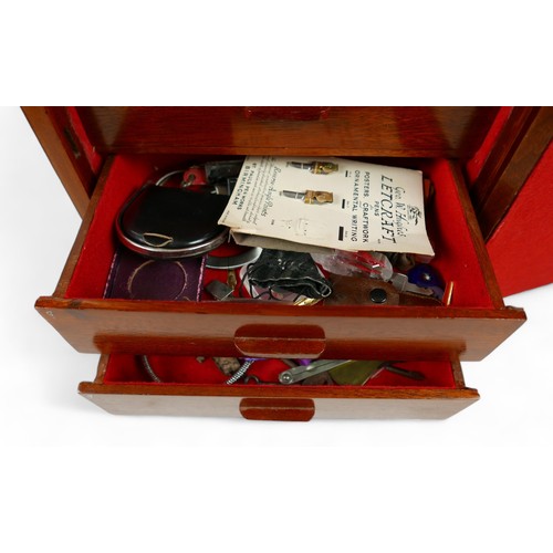 84 - A collection of mainly English coins and other items contained in a nine drawer mahogany collectors ... 