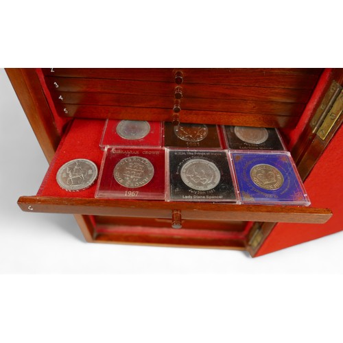 84 - A collection of mainly English coins and other items contained in a nine drawer mahogany collectors ... 