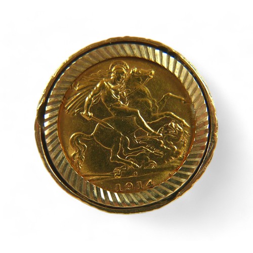 88 - A George V gold half sovereign, 1914, set in a 9ct gold ring with open scrollwork shoulders, size N/... 