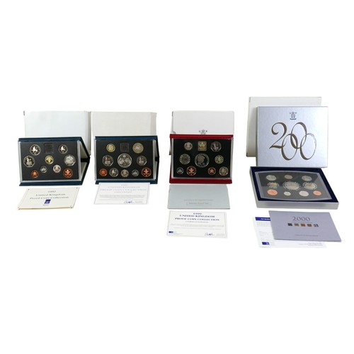 78 - A collection of four UK Royal Mint issue proof sets, comprising 1992, 1997, 1999, and 2000, in origi... 