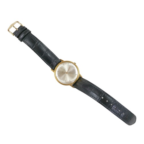 102 - A vintage Favre-Leuba gentleman's wristwatch, circa 1960s, with yellow metal case, the circular silv... 