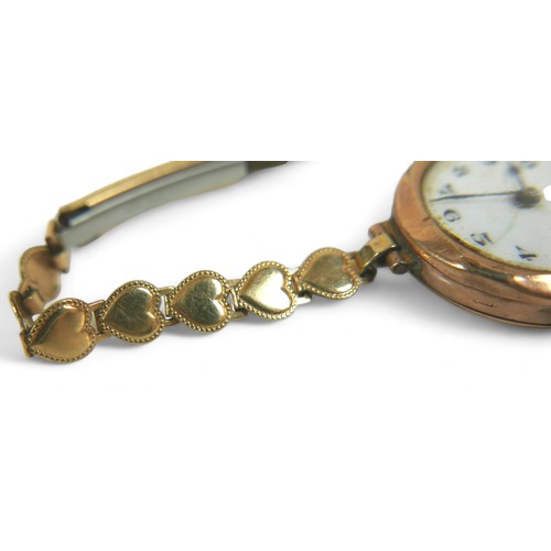 104 - Two 9ct gold cased watches, comprising a lady's Rolex watch head with presentation inscription to ca... 