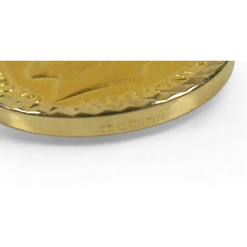 217 - A George V gold sovereign, 1911, in 9ct gold mount, on a 9ct gold chain, total weight 18.7g.