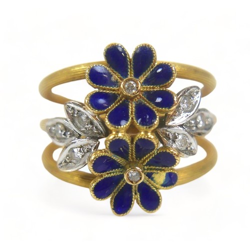 203 - A diamond and enamel flower head ring, with eight small diamonds, the band stamped '750', size M, 7.... 