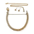 A diamond bracelet on gold mounts set with 105 bright cut diamonds set in chevrons of three stones, ... 