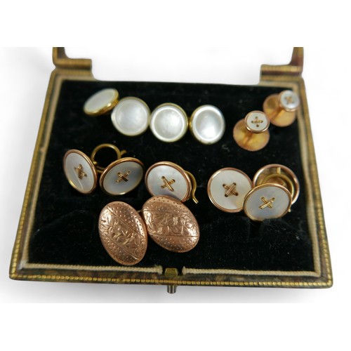 163 - A small group of gold, silver, and gilt metal jewellery, comprising several pairs of mother of pearl... 