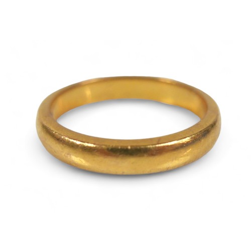 213 - A 22ct yellow gold band ring, 6 grams, size O, 21mm by 3.5mm external.