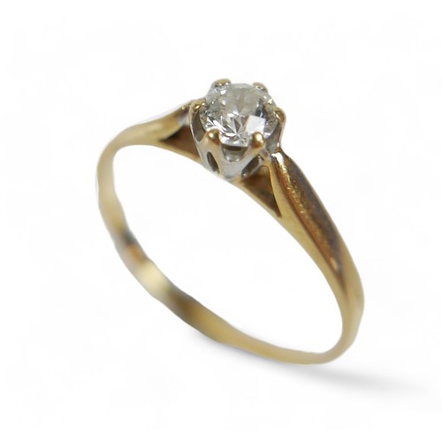 215 - An 18ct yellow gold solitaire diamond ring, the diamond 0.30ct G/VSI. Ring size Q, 2.3 grams. with a... 