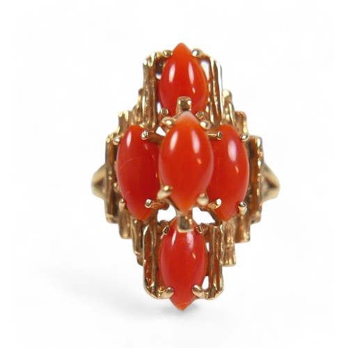 142 - A 14ct yellow gold coral ring, size M, head size 14 by 11 by 22mm, 5.6g