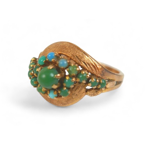 170 - An 18ct Egyptian yellow gold turquoise ring, size O, 6.2g.