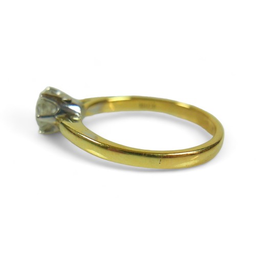 231 - An 18ct yellow and white gold, diamond solitaire ring, the brilliant cut stone, 6.4 by 4.0mm, approx... 