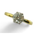 An 18ct yellow and white gold, diamond solitaire ring, the brilliant cut stone, 6.4 by 4.0mm, approx... 