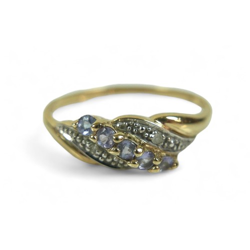 145 - A group of of three 9ct gold dress rings, comprising a pear shaped blue stone ring, 18.57mm at wides... 